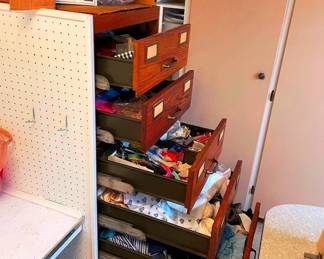 Sewing room full of fabrics and sewing accessories