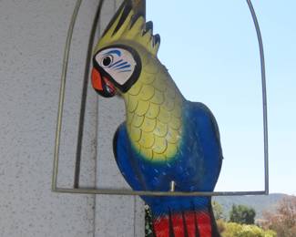 Paper mache parrots.