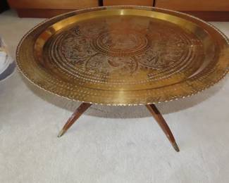Brass wall plate or coffee table.