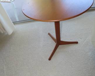 One of two matching MCM round end tables. NK made in Sweden.