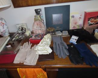 Brand new make up (sealed), gloves, silk scarves.