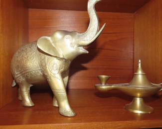 Brass elephant and Aladdins lamp.