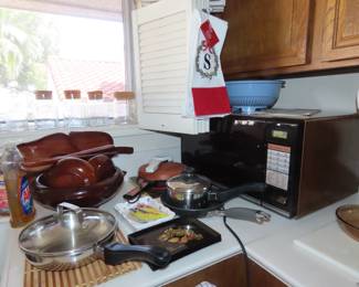 Cookware and large microwave. Crepe maker and monkey pod set.