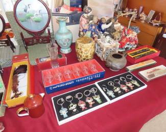 Silk embroideries, crystal sherry glasses, 2008 Bejing Olympic key chains. vases, figures, trinket boxes.