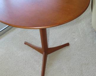 One of two matching MCM round end tables. NK made in Sweden.