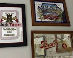 mirrored beer signs