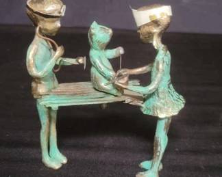 Vintage brass playing doctor sculpture