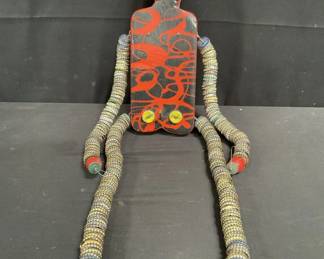 Folk art bottle cap figure signed Underwood, vintage toy
