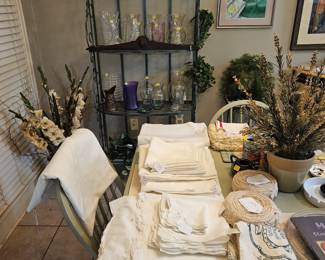 Vintage and other linens, baker's rack, vases, faux plants 