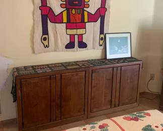 Two Solid Wood Cabinets, Handmade Strawberry Wreath Quilt, and South American Tribal Wall Hanging