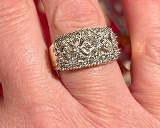 14k gold and diamond ring. Removed daily.