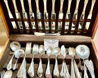 Wallace sterling flatware “Rose Point”.