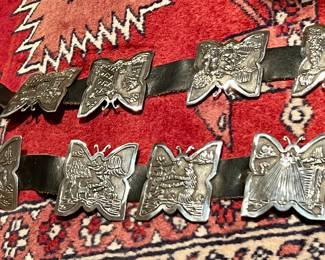 Signed sterling story maker butterfly belt.