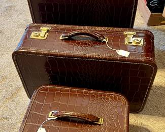 Alligator patterned vintage suitcases 