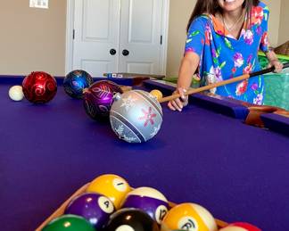 Tish playing pool, pool table 