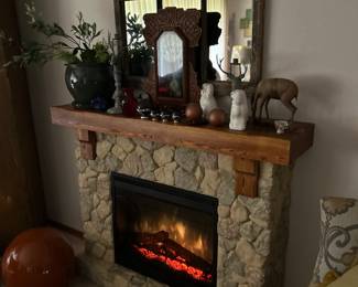 Stone front full fireplace. Turn any room into cozy cabin.