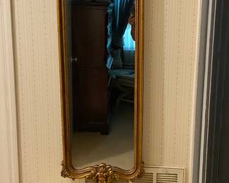 Large mirror with wall table.
