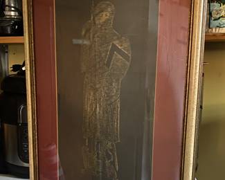 Brass Rubbing. We have two and one copper rubbing. They do not photograph well. 