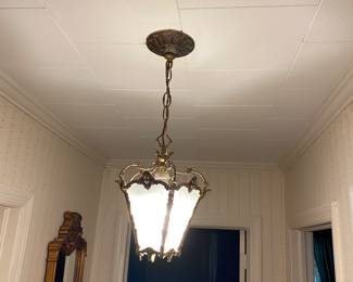 Antique brass light fixture.