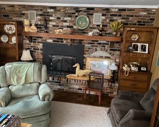 Recliners, lamps, collectibles, bookcases, artwork. 