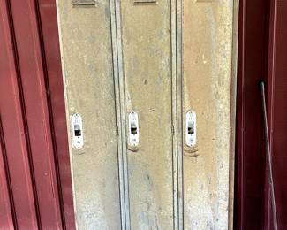 Seriously vintage military lockers. All doors open.