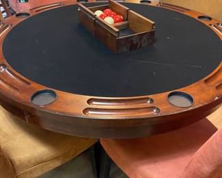 Dining table converts to game table
Bumper pool & poker