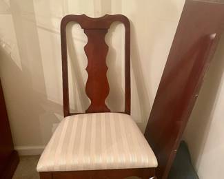 One of six chairs to dining table