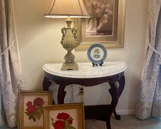 Framed florals, beautiful wood marble table, lamp