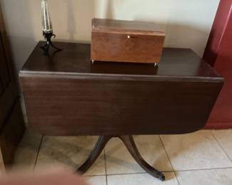 Solid wood table folds up to easy storage $125