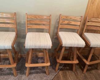 4 Swivel Bar Stools With Cushioned Beige Top