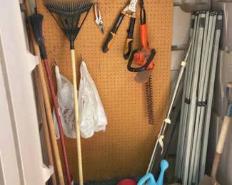Outdoor Tools And The Shed They Are Pictured In