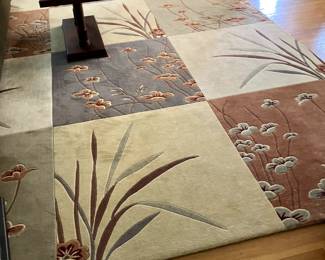 beautiful area rug, looks like a painting, very special and many compliments, comes with underpad. $400