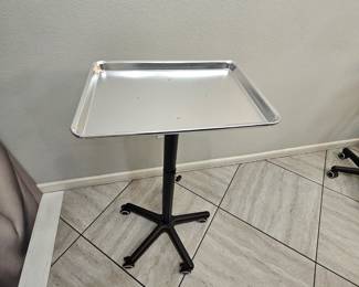 7 silver trays on wheels 25.00 each or make offer
