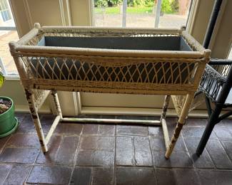 #24 Antique wicker planter 29x12x24 $40.00