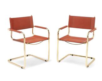 1010
Late 20th/early 21st century
A pair of Italian Modern armchairs
Each with sticker to underside: Made in Italy
Each chair with gold-toned metal cantilevered frame, with leather sling seat and seatback, and leather armrests
2 pieces
Each: 32" H x 23.5" W x 24.5" D
Estimate: $600 - $800
