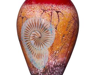 1239
Richard Satava (b. 1950)
An art glass vase, late 20th/early 21st century
With etched signature and inscription to underside: Satava / 2176-01
Depicting turtle petroglyphs and ammonites
15.75" H x 9.5" Dia.
Estimate: $200 - $300