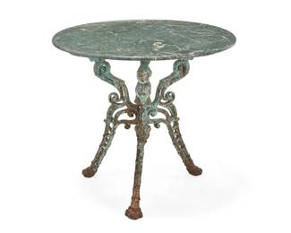 1062
Mid/late 20th century
A wrought-iron and marble garden table
The tripod table with acorn drop finial, each leg with female masks and paw feet, surmounted by a green marble top
28" H x 32" Dia.
Estimate: $400 - $600
