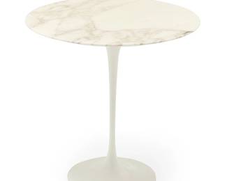 1087
Eero Saarinen (1910-1961)
A Tulip side table for Knoll Studios, 2005
Designed 1956
The metal tag to underside: Knoll Studio / Eero Saarinen / 1956; dated to paper label
The enameled metal base surmounted by a white marble top
20.375" H x 20.125" Dia.
Estimate: $400 - $600