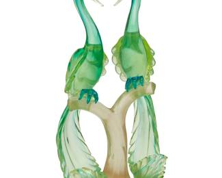 1156
20th century
A Murano art glass peacock sculpture
Unmarked, with remnants of possible manufacturer's sticker to base verso
Comprising two uranium glass peacock figures perched on a gold-flake impregnated branch
Overall: 24.25" H x 11" W x 8" D
Estimate: $300 - $500