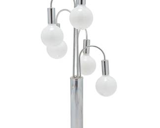 1094
Mid-20th century
A Modern waterfall table lamp
The chromed metal cylindrical standard issuing five cascading lights, electrified
Overall: 40" H x 16.5" Dia.
Estimate: $400 - $600