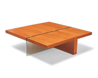 1237
A Contemporary wood and glass coffee table Late 20th/early 21st century
The wood table raised on a lateral wood and medial glass panel
11.875" H x 41.75" W x 41.75" D
Estimate: $300 - $500