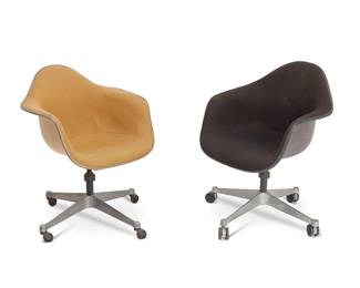 1355
Charles and Ray Eames (1907-1978 and 1912-1988)
Two swivel "Shell Armchair" office chairs, Circa 1970s
Each with raised stamp mark to underside: [logo] / Herman Miller; one with dated Herman Miller safety tag, the other with partial safety tag
Each seat with fiberglass shell, latex rubber trim, and fabric upholstery, raised on four aluminum legs with casters, comprising one mustard and one black, each with adjustable leaning and swivel action
2 pieces
Each: 33" H x 26" W x 26" D approximately
Estimate: $400 - $600