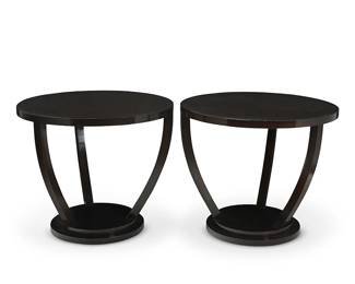 1123
Early 21st century
A pair of Modern side tables
The circular wood tables, each raised on three curvilinear legs
2 pieces
Each: 27.25" H x 32" Dia.
Estimate: $500 - $700