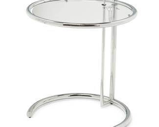 1088
After Eileen Gray (1878-1976)
A side table in the manner of the E1072 table for Aram Designs, mid/late 20th century
Designed 1927
Each unmarked
The cantilevered table with circular chromed metal frame and a glass top, height adjustable with multiple settings anchored by a linchpin
Lowest: 25" H x 20" Dia.; Highest: 40.25" H
Estimate: $200 - $400
