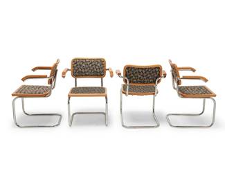 1341
In the manner of Marcel Breuer (1902-1981)
A set of Cesca-style armchairs, circa 1980s
Designed 1928
Each with partial tag: Made in Italy
Each chair with lacquered blonde wood frame and armrests, inset fabric upholstered seat and backrest, and cantilevered chromed steel tubular support
4 pieces
Each: 31.5" H x 24.5" W x 22.25" D
Estimate: $400 - $600