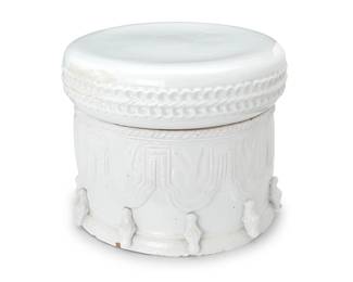 1153
Late 20th century
An Italian earthenware garden seat
The white glazed ceramic drum base depicting bound curtains in relief, surmounted by a seat top with rows of indented texture
2 pieces
Overall: 14" H x 17.5" Dia.
Estimate: $200 - $400
