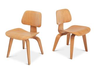 1199
Charles and Ray Eames (1907-1978 and 1912-1988)
A pair of tall "LCW" molded plywood lounge chairs for Herman Miller, 1951-1957
Designed 1946
One stamped: 8 / 51
Each with molded veneered plywood body with rubber shock mounts, set on two U-form legs, the underside screws in 5-2-4 formation
2 pieces
Each: 28.75" H x 19.75" W x 22" D; Seat height: 15.5" H
Estimate: $800 - $1,200