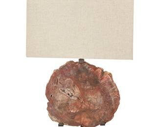 1255
Late 20th century
A Modern petrified wood-mounted table lamp
The single-light lamp with metal base mounted with a petrified wood cross-section specimen, surmounted by a square cloth shade, electrified
Lamp: 17" H x 11.75" W x 6.125" D; Shade: 10" H x 14" W x 14" D
Estimate: $500 - $700