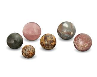 1015
20th century
A group of spherical mineral specimens
The polished spheres, comprising two septarians, a labradorite, a rose quartz, a jasper, and a petrified wood
6 pieces
Largest: 4.625" Dia.; Smallest: 2.875" Dia.
Estimate: $400 - $600