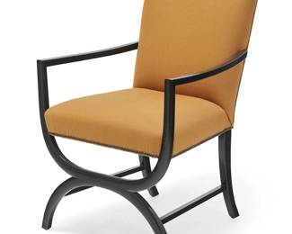 1117
Early 21st century
A Michael Berman Limited "Stella" armchair
With Michael Berman Limited fabric tag to underside
The chair with an ebonized wood frame and dark mustard upholstery with metal tacking
35" H x 25" W x 25" D
Estimate: $400 - $600